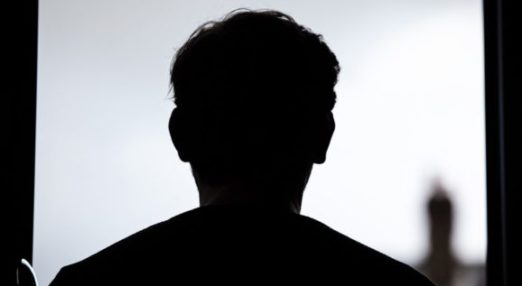 A silhouette of a man