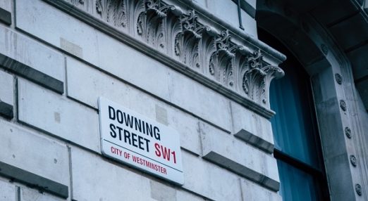 Image of downing street sign on building