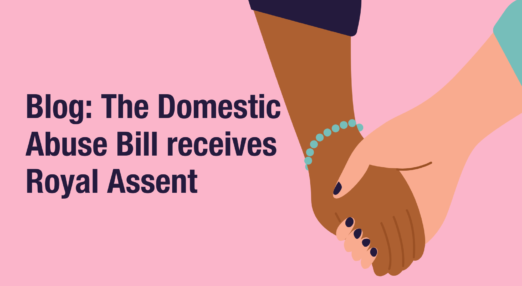 Text: "Blog: The Domestic Abuse Bill receives Royal Assent" Image: Two hands holding.