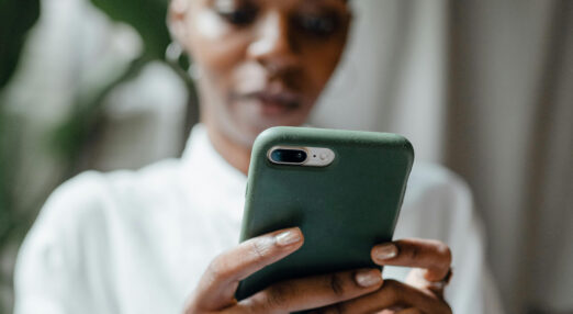 Woman holding mobile phone